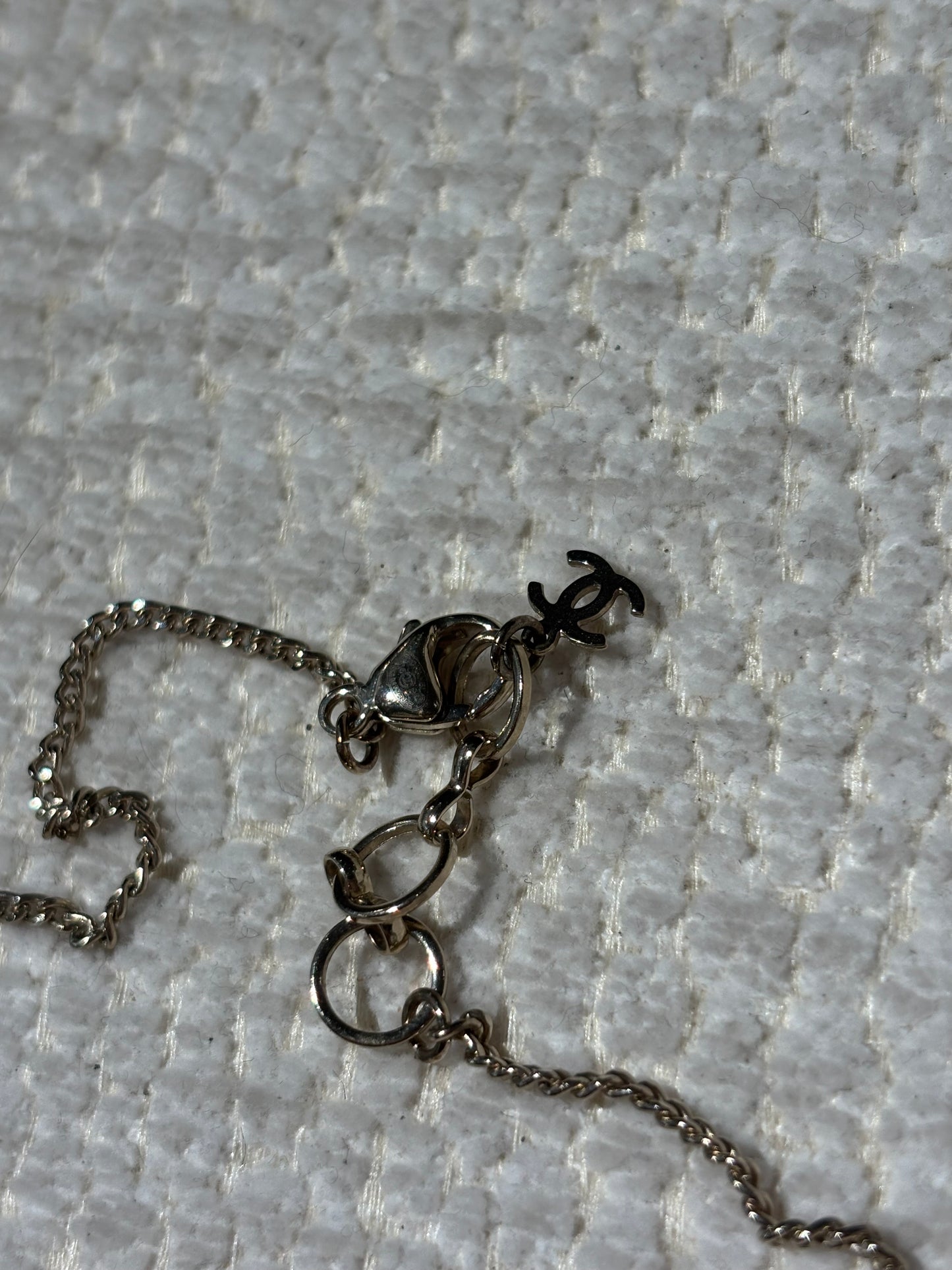 Chanel Camelia Necklace – Soft Pink Resin with Pearl Details