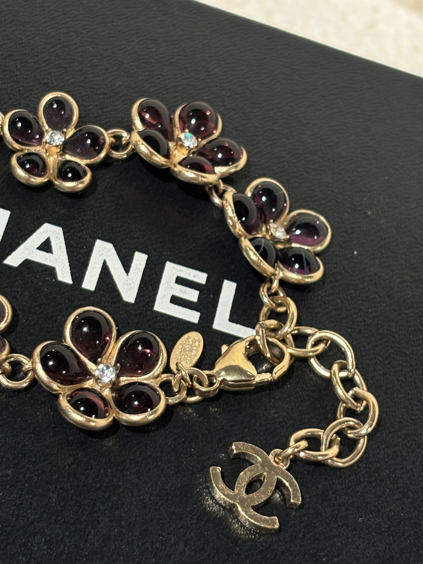 Chanel Bracelet – Gold-Tone Metal, Lilac Flower Motifs & CC Charm