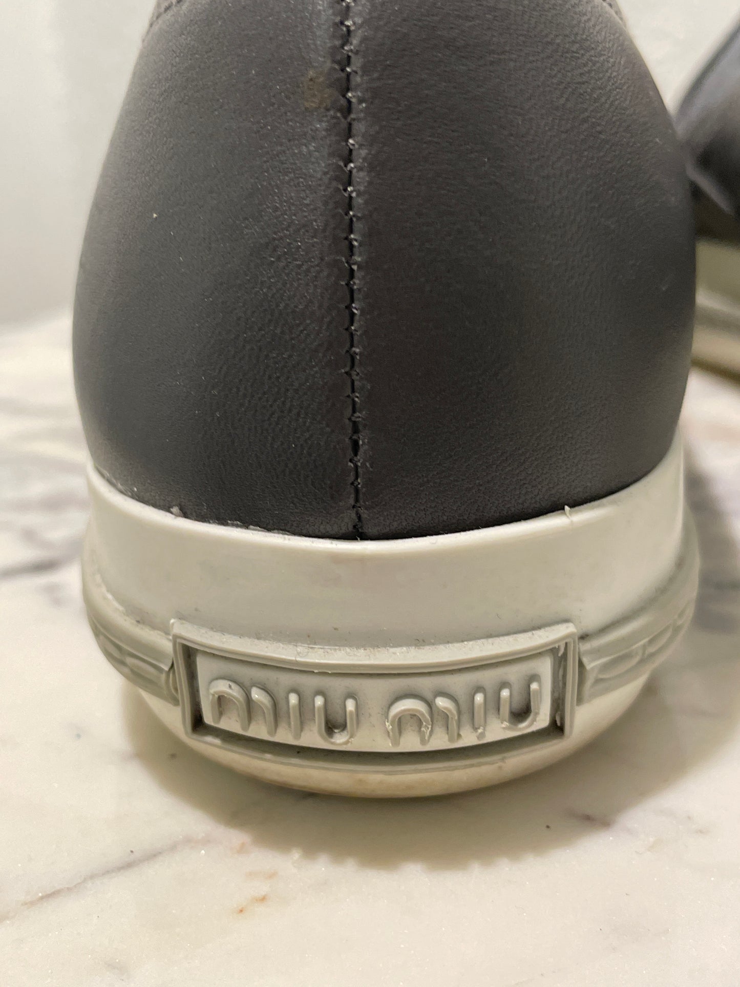 Authentic Miu Miu Grey Leather Metal Cap-Toe Slip-On Sneakers - 39