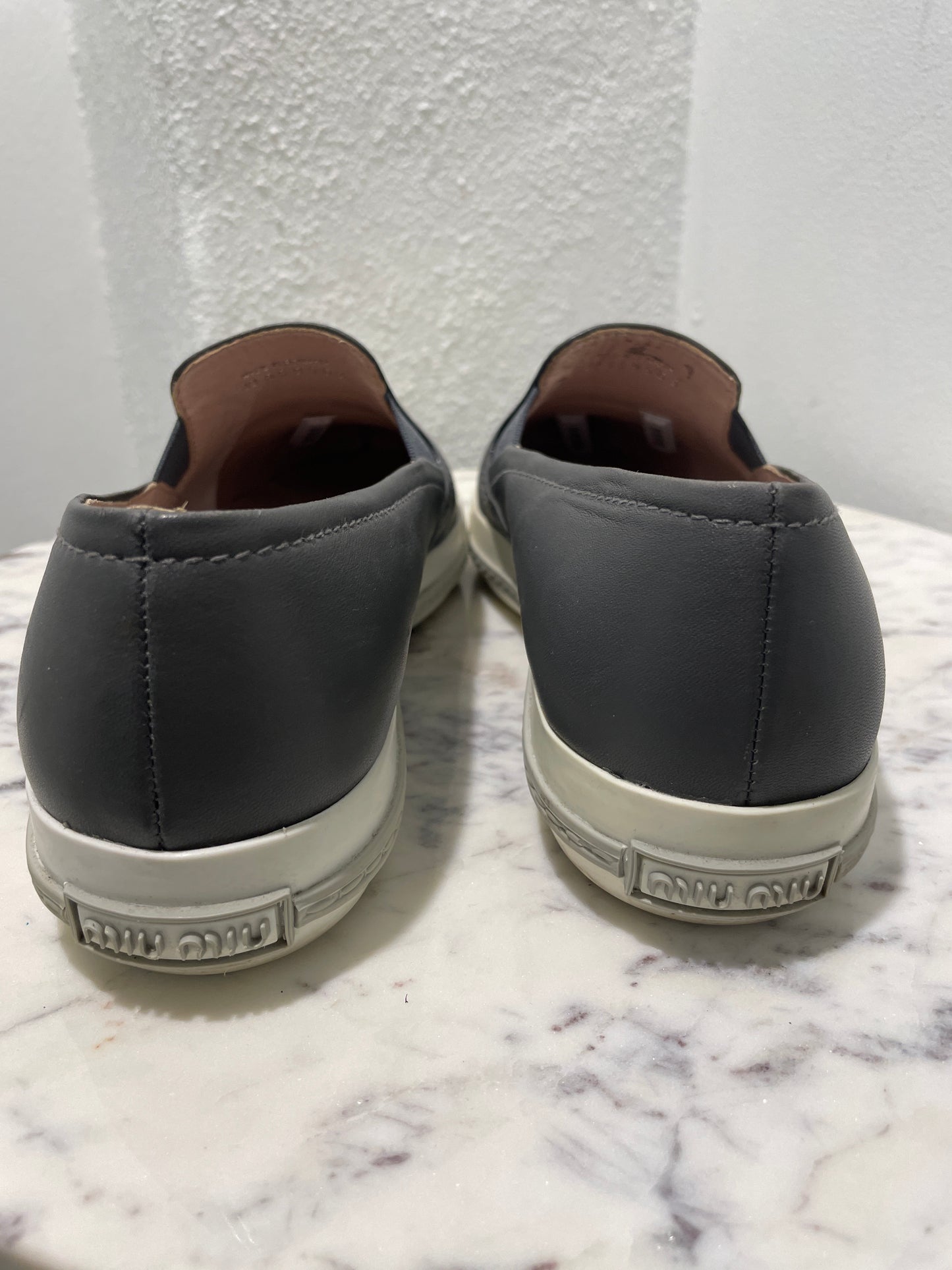 Authentic Miu Miu Grey Leather Metal Cap-Toe Slip-On Sneakers - 39