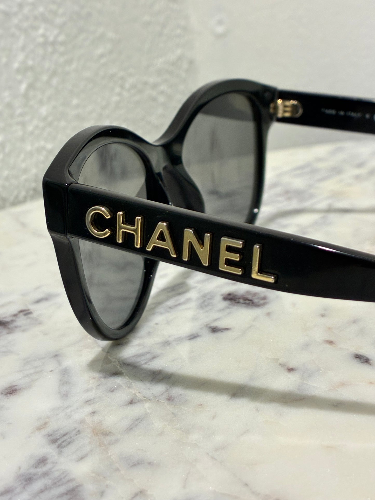 Chanel Sunglasses - Gold CHANEL Logo text