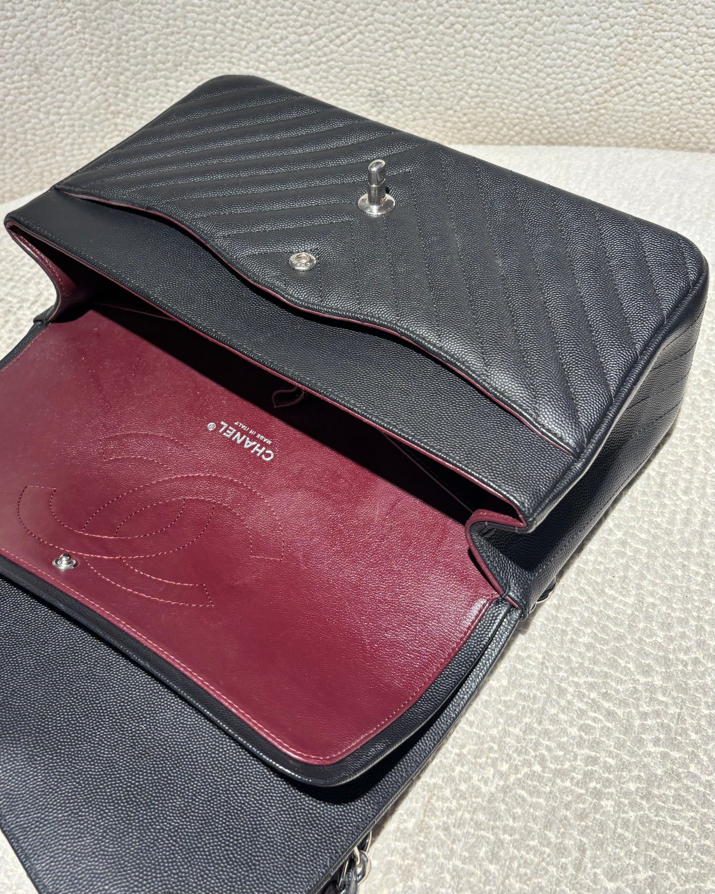 Chanel Classic Flap Bag Chevron - Jumbo - Black Caviar & Silver Hardware