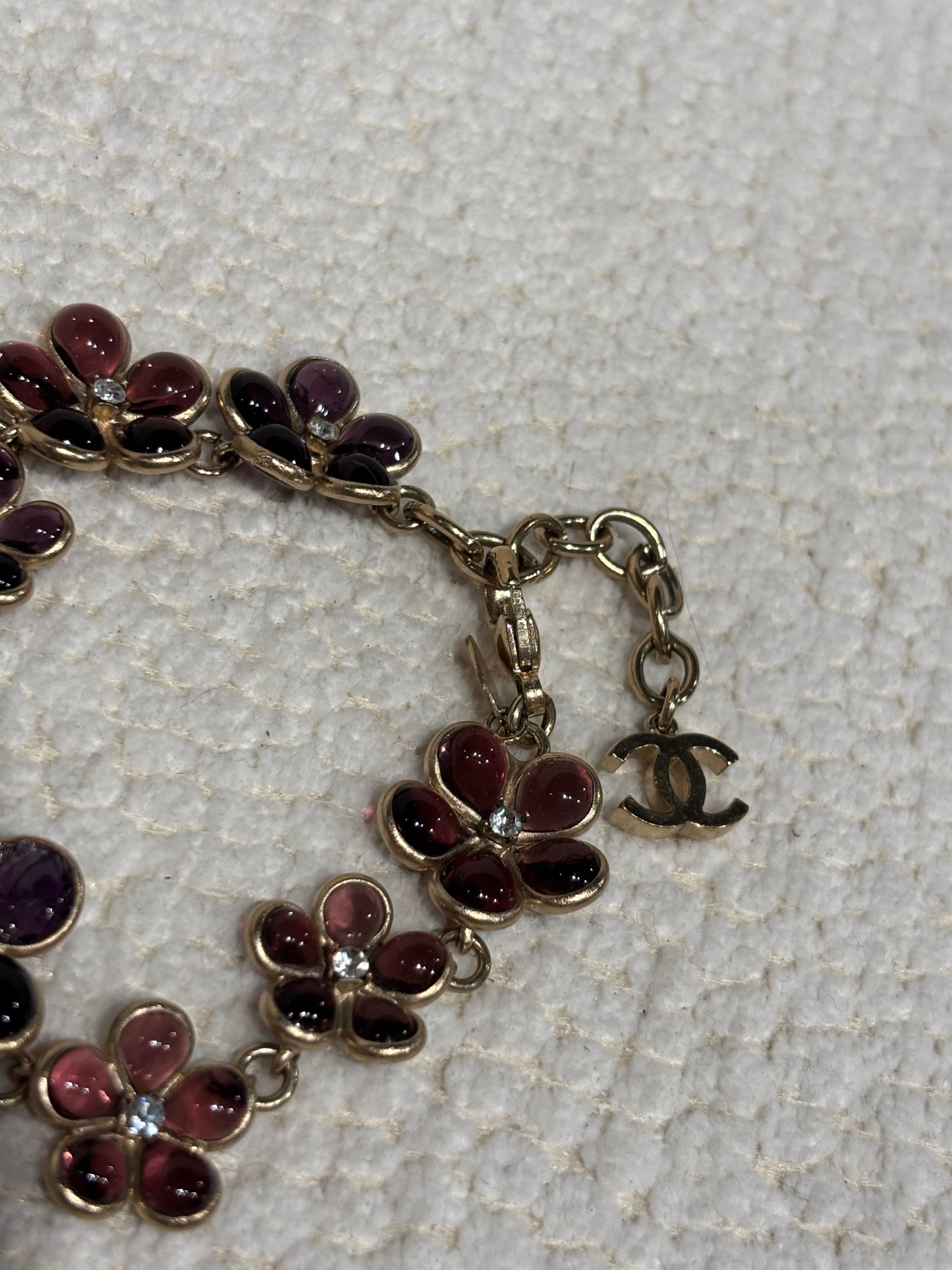 Chanel Bracelet – Gold-Tone Metal, Lilac Flower Motifs & CC Charm