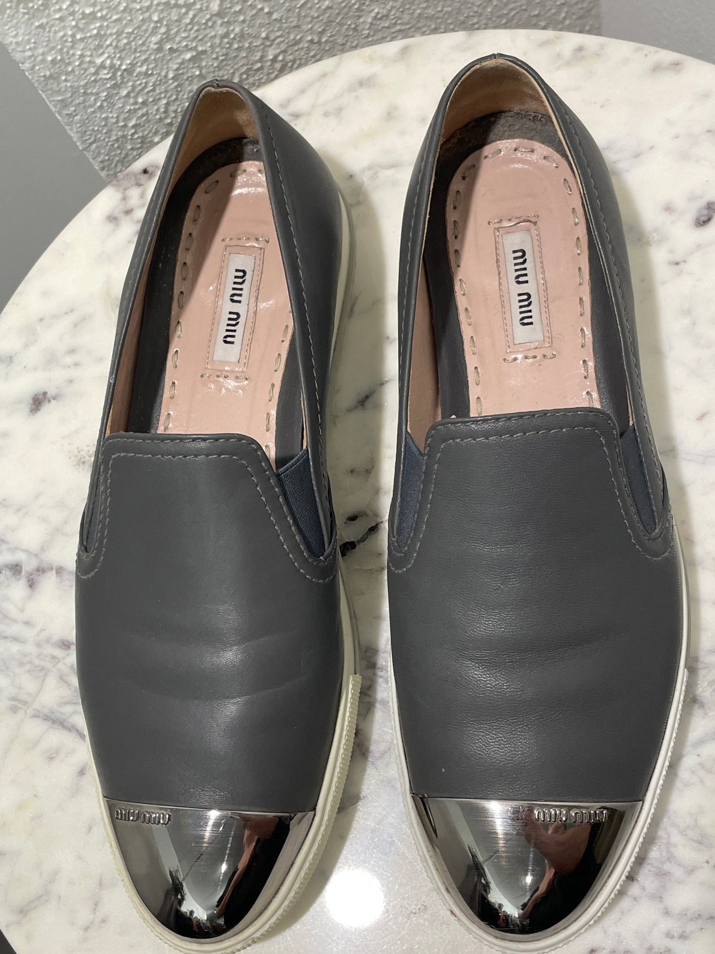 Authentic Miu Miu Grey Leather Metal Cap-Toe Slip-On Sneakers - 39