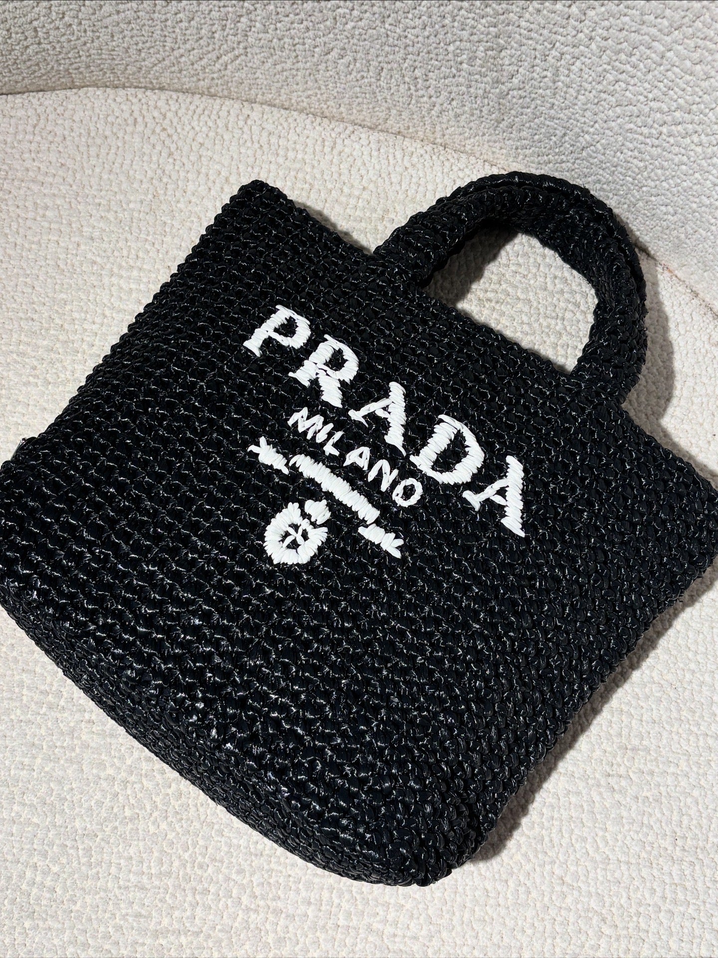 Prada Raffia Tote – Black with White Logo Text