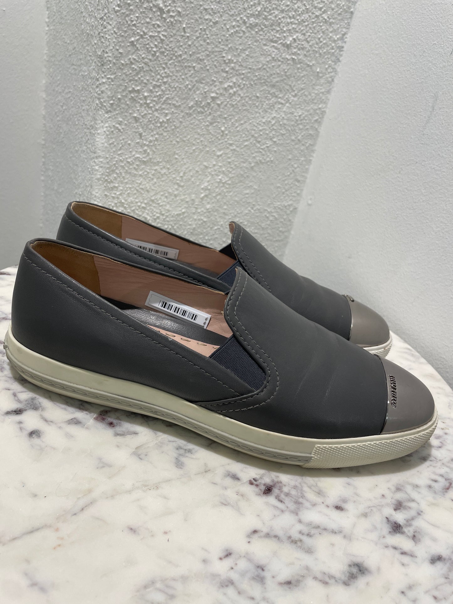 Authentic Miu Miu Grey Leather Metal Cap-Toe Slip-On Sneakers - 39