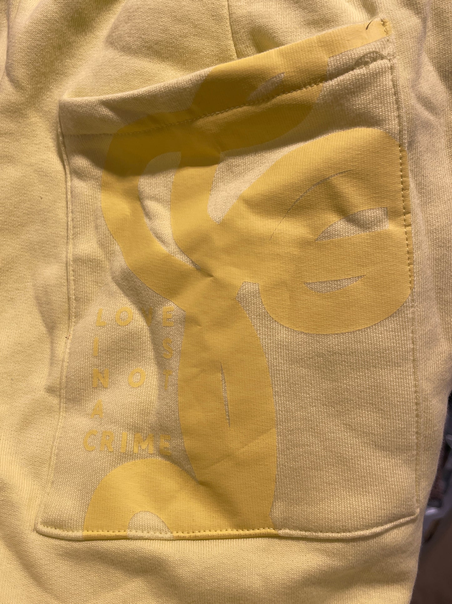 Amnesty International - MN - Love is not a crime - sweatpants - Medinas Wardrobe m