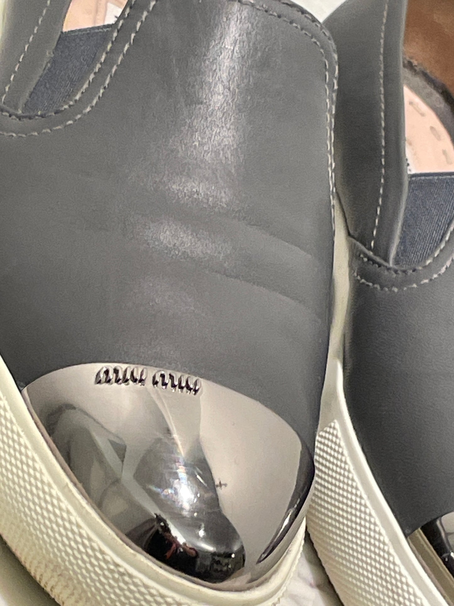Authentic Miu Miu Grey Leather Metal Cap-Toe Slip-On Sneakers - 39